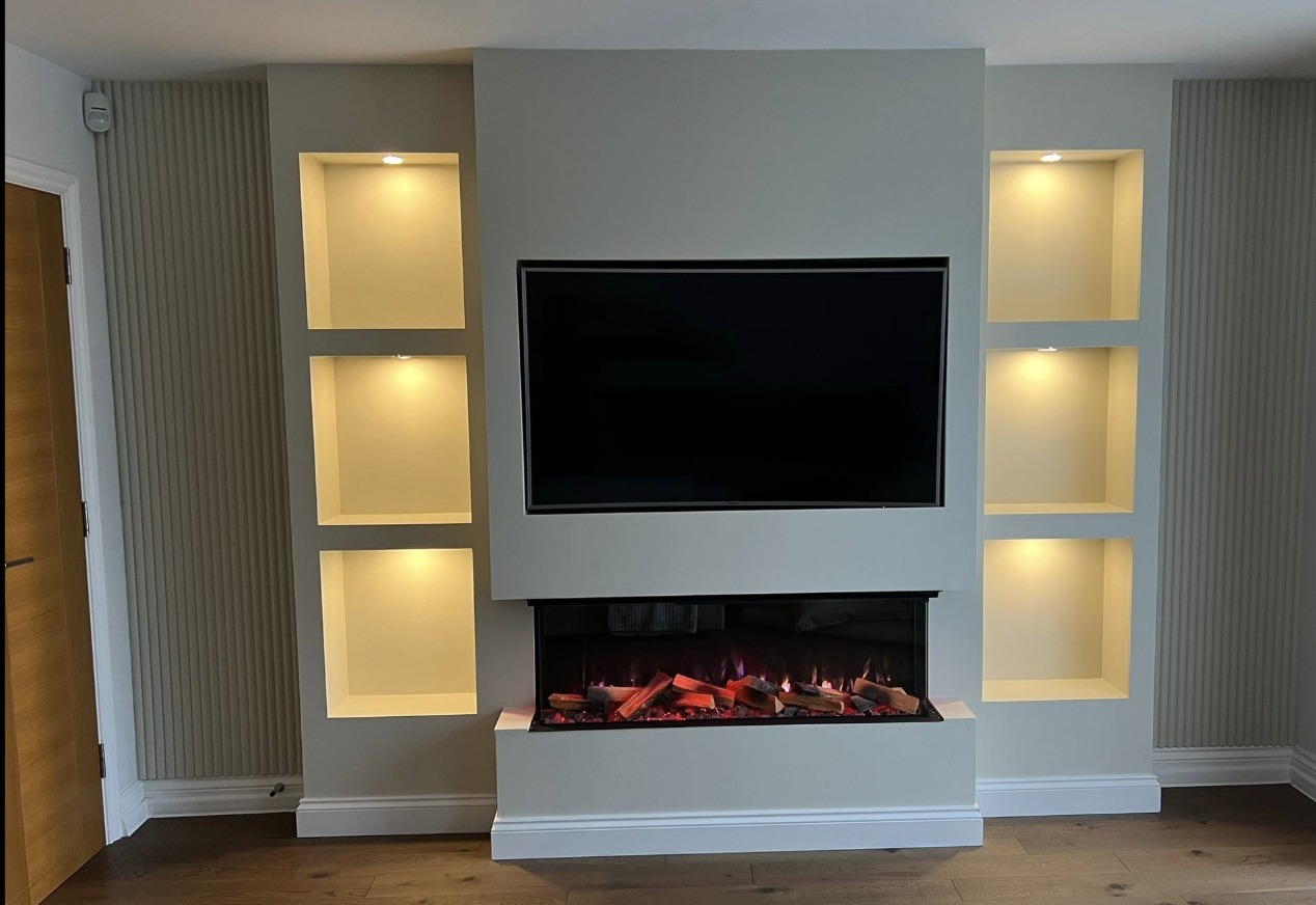 A finished media wall and fireplace installation by Octopus Handyman